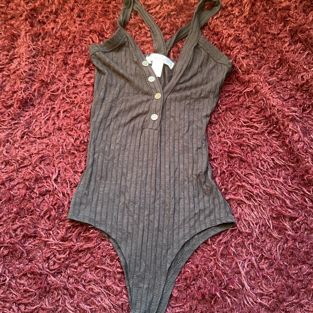 low cut bodysuit w buttons and cross back straps
